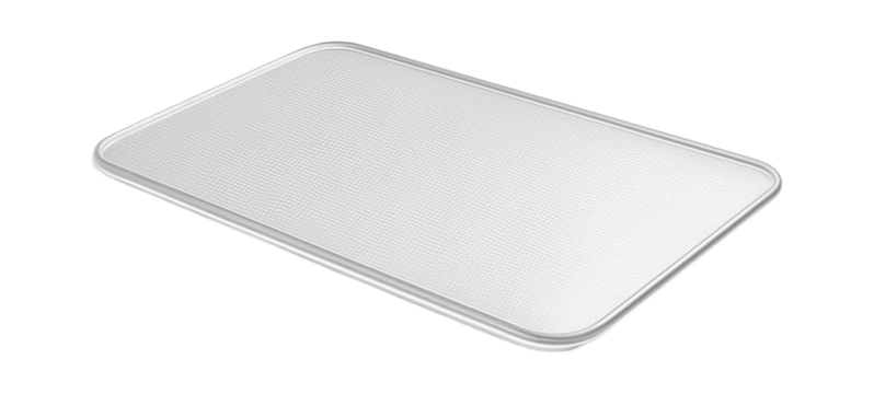 A transparent vinyl mat with textured surface, suitable for use under pet bowls in a small dining area.