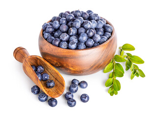 Organic blueberry in natural antique crafting wooden scoop. Scattered Berries still life. Healthy...