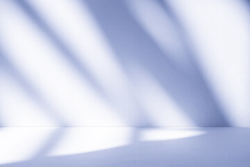 Wall interior background, studio and backdrops show products.with shadow from window color white and blue background for text insertion and presentation product	
