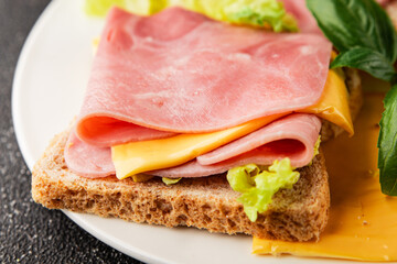 Sandwich ham, cheese, bread toast meat spam fresh delicious gourmet food background on the table...