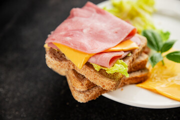 Sandwich ham, cheese, bread toast meat spam fresh delicious gourmet food background on the table...