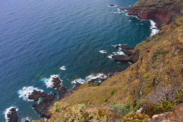 Volcanic cliff above Atlantic ocean