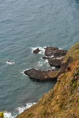 Volcanic cliff above Atlantic ocean