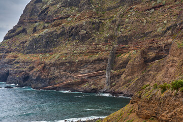Volcanic cliff above Atlantic ocean