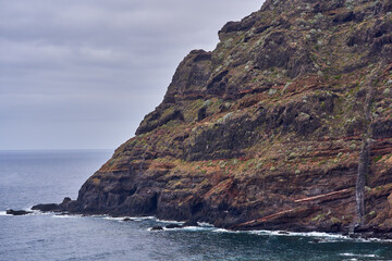 Volcanic cliff above Atlantic ocean