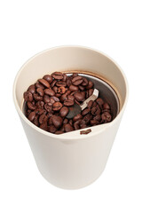Roasted coffee beans in an electric coffee grinder, isolated on white background