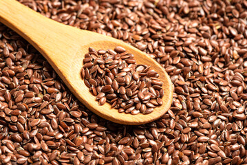 Linseed or flaxseed on wooden spoon