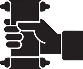 title: Hand holding scroll glyph icon. Ancient manuscript or diploma vector.