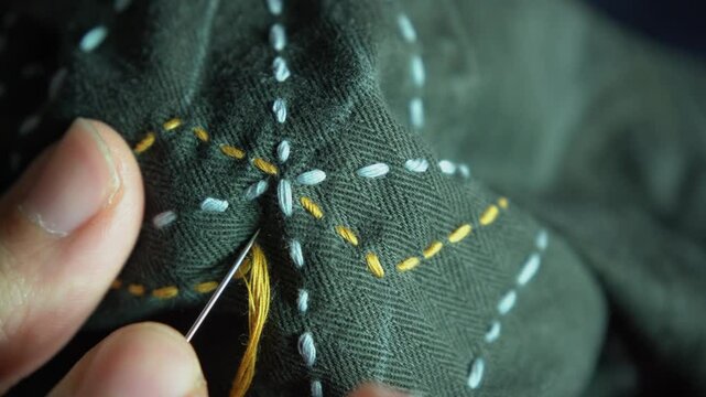 Sashiko, a traditional Japanese embroidery and stitching technique, is employed for the repair of garments.