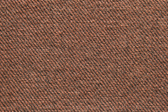 Brown denim cotton twill fabric pattern close up as background