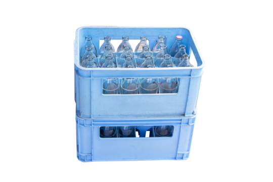 Glass clear bottles in plastic crate blue isolated on cutout PNG or transparent background. Drinking water wait for distribute to grocery. Packaging for sale in supermarkets or wholesale stores.