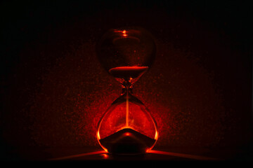 artistic glowing hourglass like sunrise or sunset, symbolizing time and creativity. Vibrant...