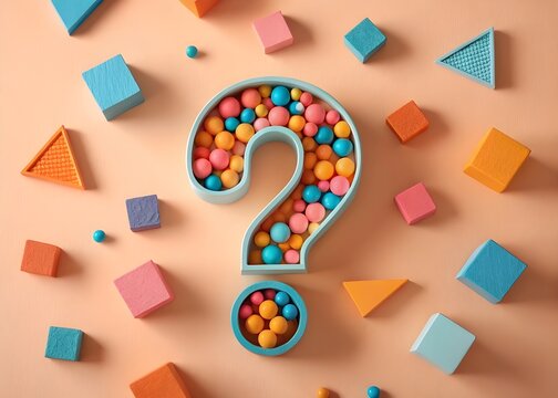 Question mark filled with colorful balls and scattered geometric shapes