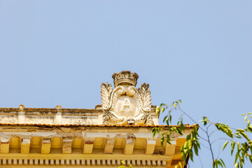 Architectural detail with Ajaccio crest on historic building, France, Corsica, Ajaccio, 13 June 2025