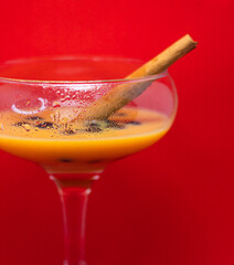 glass of liqueur with berries