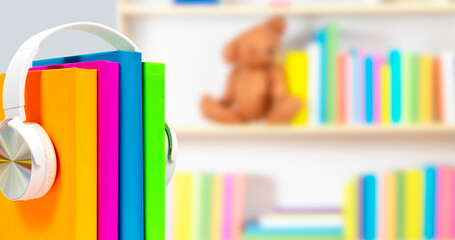 Books with headphones. Audiobook concept. Listening to lectures, learning languages, podcast,...