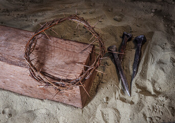 Crown of Thorns associated with the Passion of Jesus Christ. Fragment of a wooden cross symbol of...