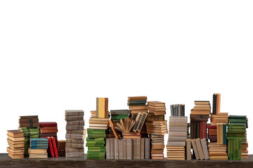 Stacks of many books on a shelf or table on an isolated background. Concept of library, reading,...