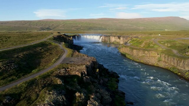 Aerial view of godafoss waterfall in scenic valley, Iceland.