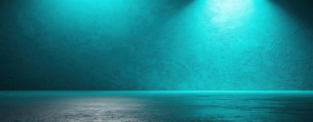 Illuminated turquoise wall with spotlight and reflective floor creating a studio backdrop scene