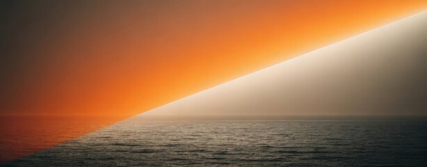 Dramatic diagonal light splits orange sky over calm ocean horizon