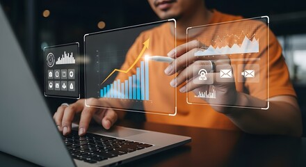 Male professional analyzes charts on digital interface, using laptop, showcasing financial data for a successful business strategy, while optimizing the growth project.