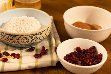 Ingredients for Baking Flour, Cinnamon, and Dried Cranberries