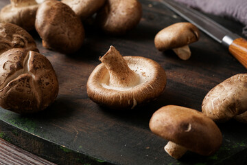Fresh Shiitake Mushrooms on Wooden Surface for Healthy Cooking and Plant-Based Meals