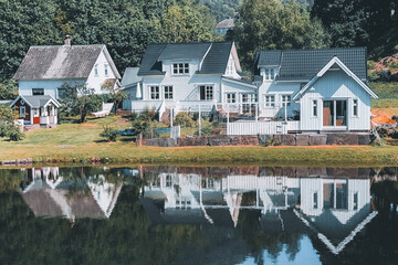 beautiful house with reflection in water
