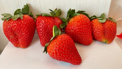 strawberries on a wooden background