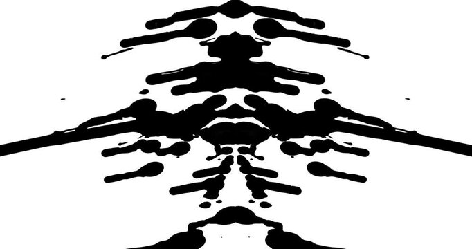 Slow motion of black paint drips on a white background that is mirrored to make a Rorschach image.