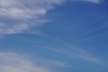 clear blue sky with white clouds