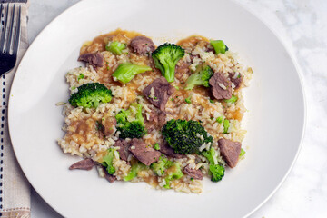 beef and broccoli on white rice