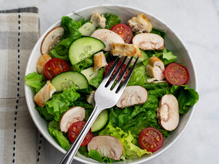 fresh salad top with chicken