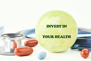 THE CONCEPT PHRASE INVEST IN YOUR HEALTH. Concept health, sport, diet and fitness