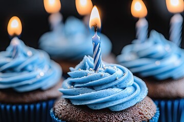 Birthday cupcakes with blue frosting and candles (1)