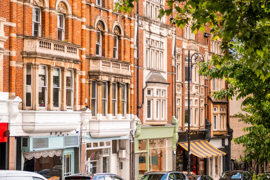 London- Street of residential British properties above commercial shops and offices