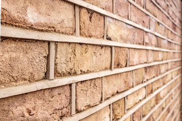 Newly built solid brick wall with neat clean mortar