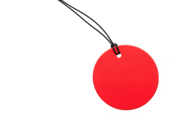 A bright red tag with a black string is ready for pricing and product labeling isolated on transparent background