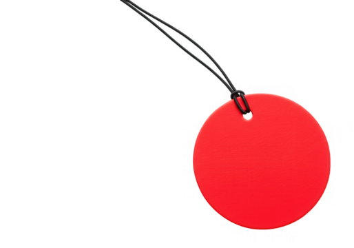 A bright red tag with a black string is ready for pricing and product labeling isolated on transparent background