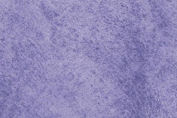 grunge artistic backdrop: close up of canvas stained with violet paint