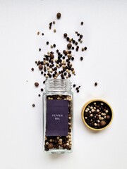 Scattered Peppercorns with Wooden Bowl