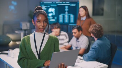 Confident businesswoman leading a diverse team of professionals in corporate boardroom, brainstorming business strategy analyzing financial data, and discussing startup growth and leadership success - Powered by Adobe