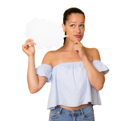 Portrait of beautiful doubtful young woman holding blank paper speech cloud in hand and holding finger on chin, thinking over new idea, isolated on transparent background. PNG.