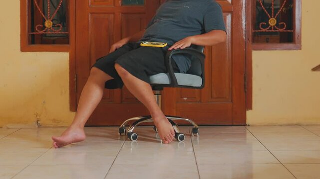 Person Relaxing in an Office Chair