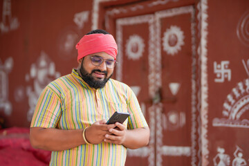 Indian farmer using smartphone