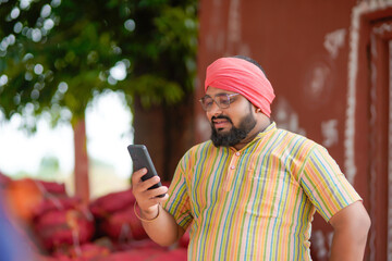 Indian farmer using smartphone