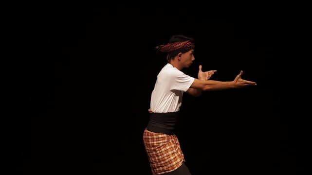 Traditional Male Dancer Performing on Stage