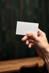 Blank business card mockup in hand. Generative ai