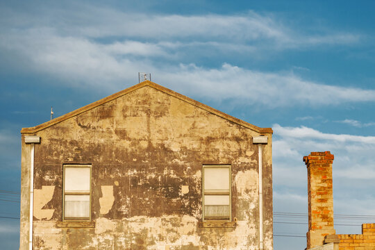 The side of a decaying building